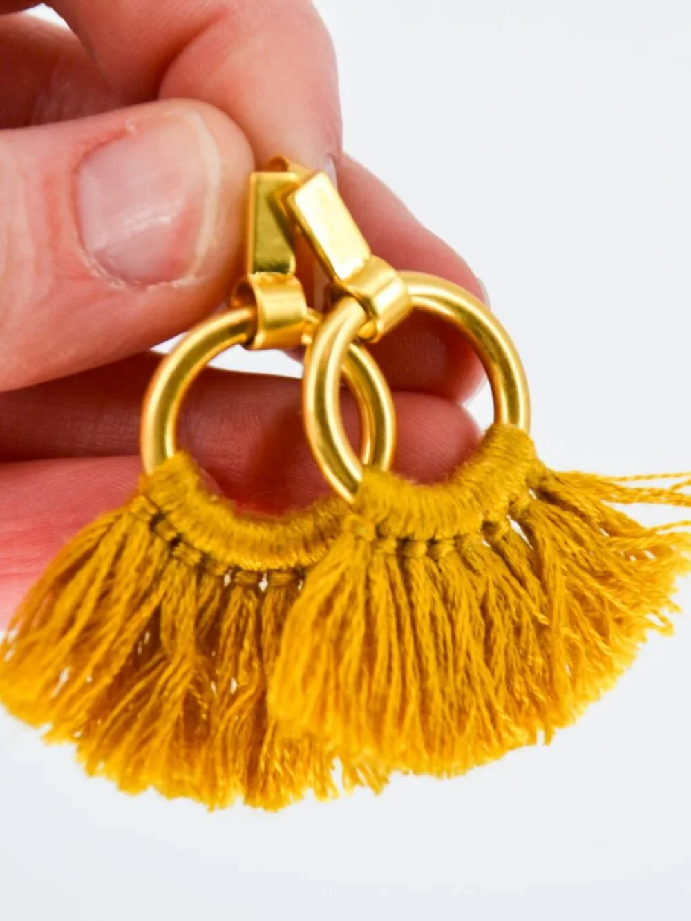 Madewell tassel statement